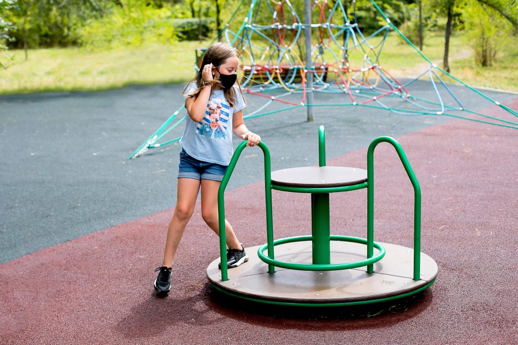 Child in a park during a staycation